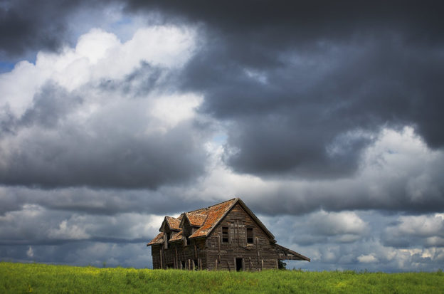 House beneath a stormy sky